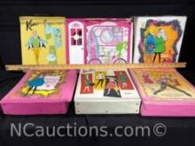5 Barbie doll cases full of cloths and Barbie doll house