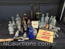 vintage glass bottles of various size