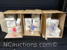 3 cases of shelf sitting figures