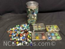 lot of marbles with glass shooters