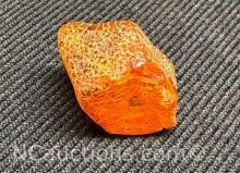 Amber piece 1.07 grams. Quarter for size reference only.