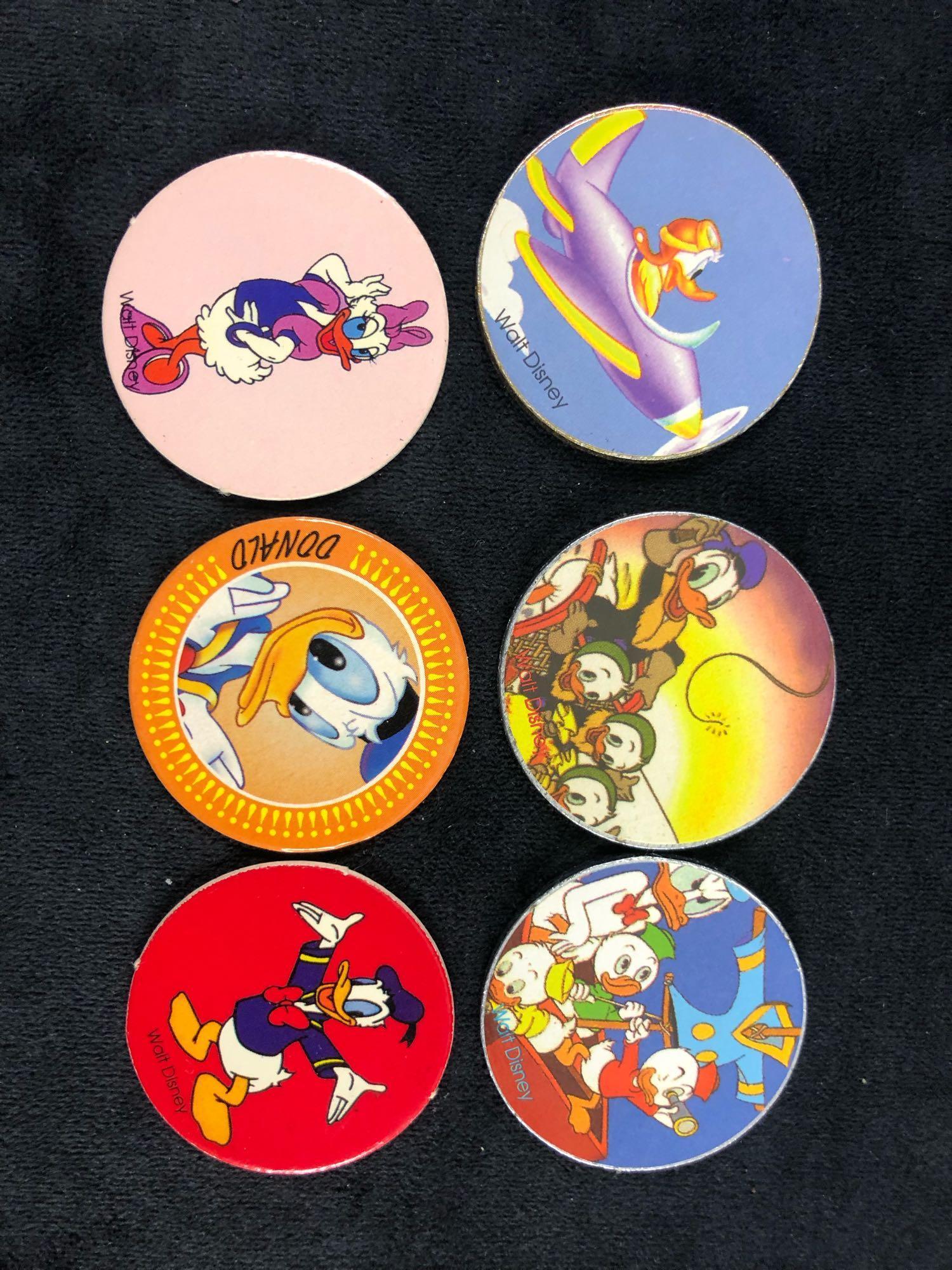 A lot of 6 Donald Duck Daisy Nephews Huey, Dewey Louie Pogs Slammers and Cardboard