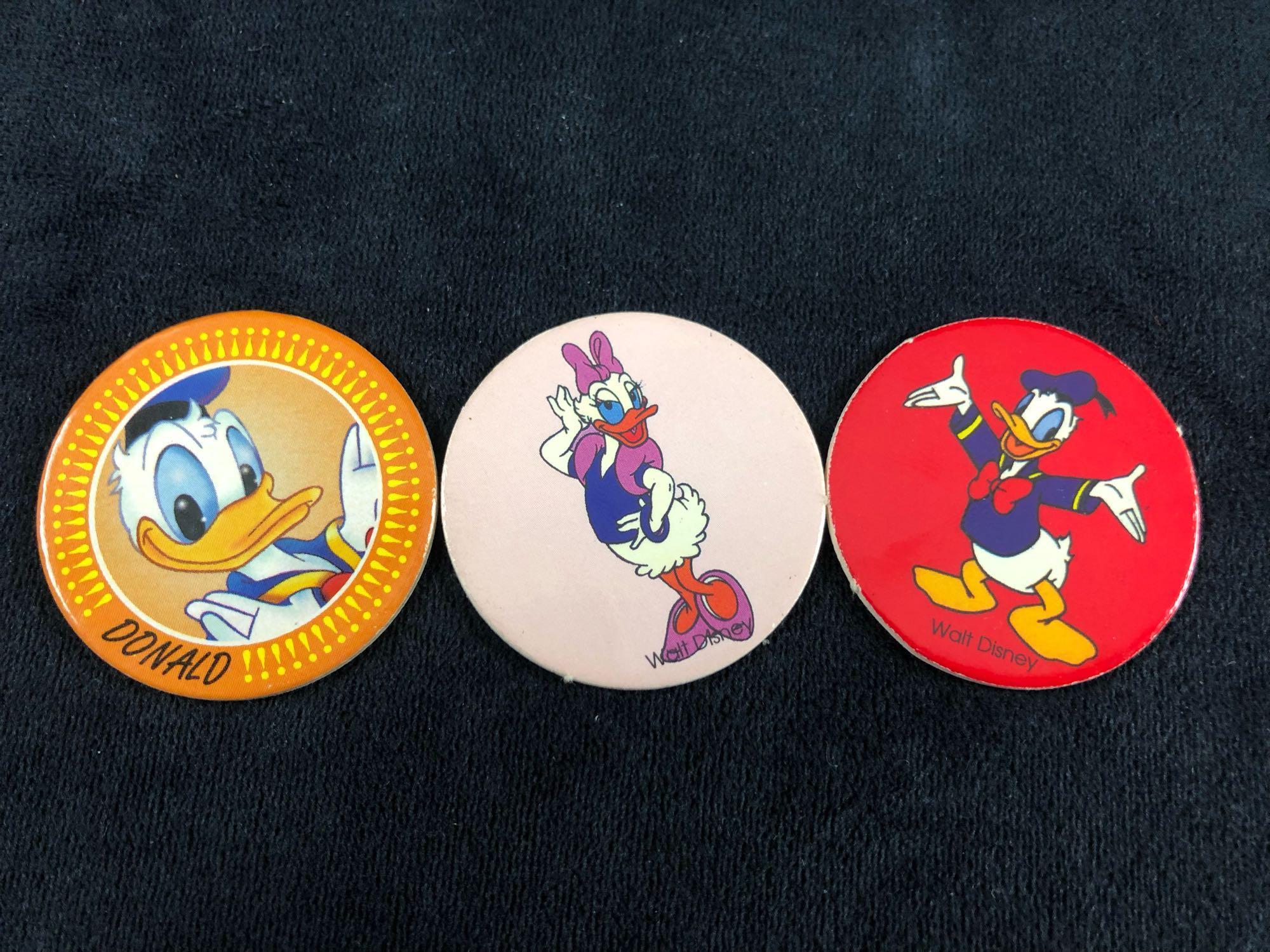 A lot of 6 Donald Duck Daisy Nephews Huey, Dewey Louie Pogs Slammers and Cardboard