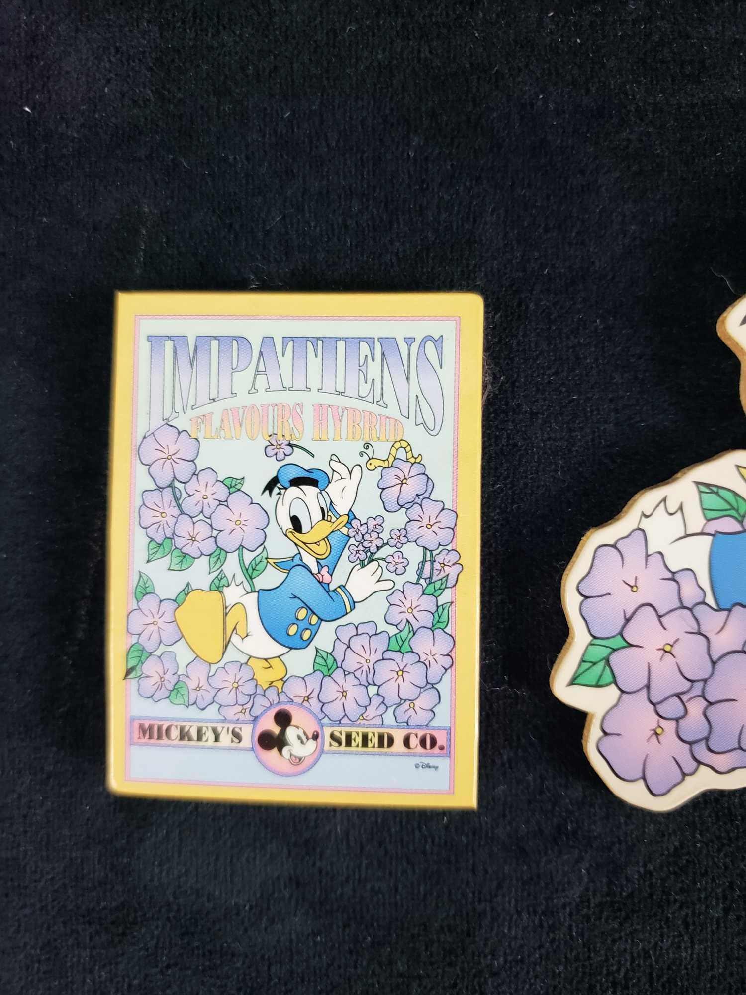 Lot of 4 Donald and Daisy Duck Floral Magnets