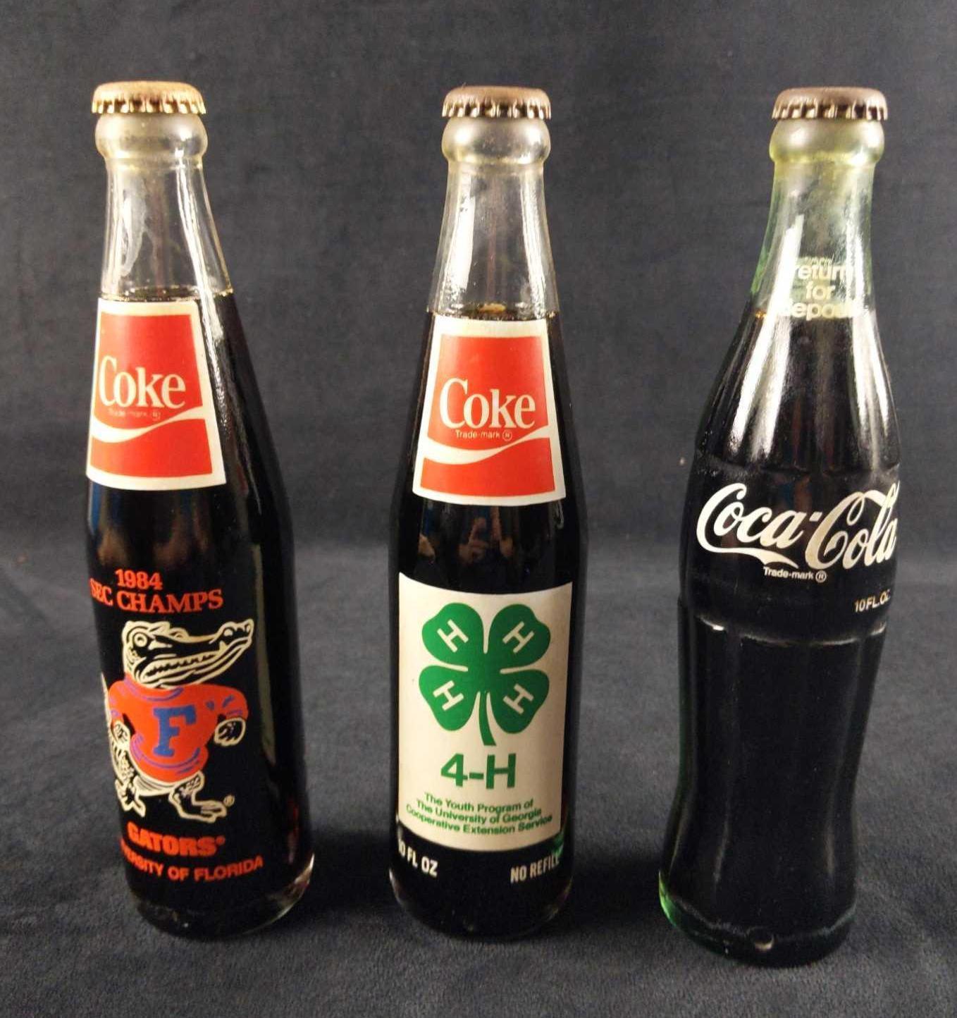 Three Vintage Coca Cola Bottles Gators Rock Eagle