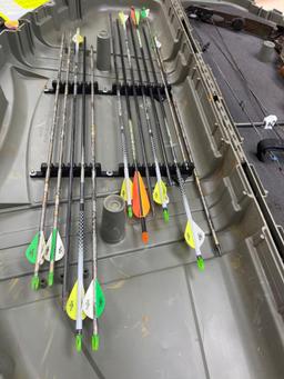 Mathews bow and arrows in hard case