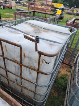 2 300 gallon tanks with metal cage