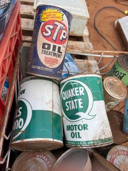 vintage oil cans and outdoor flood light