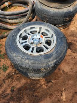 2 used 205/75/15 tires and 5 lug wheels