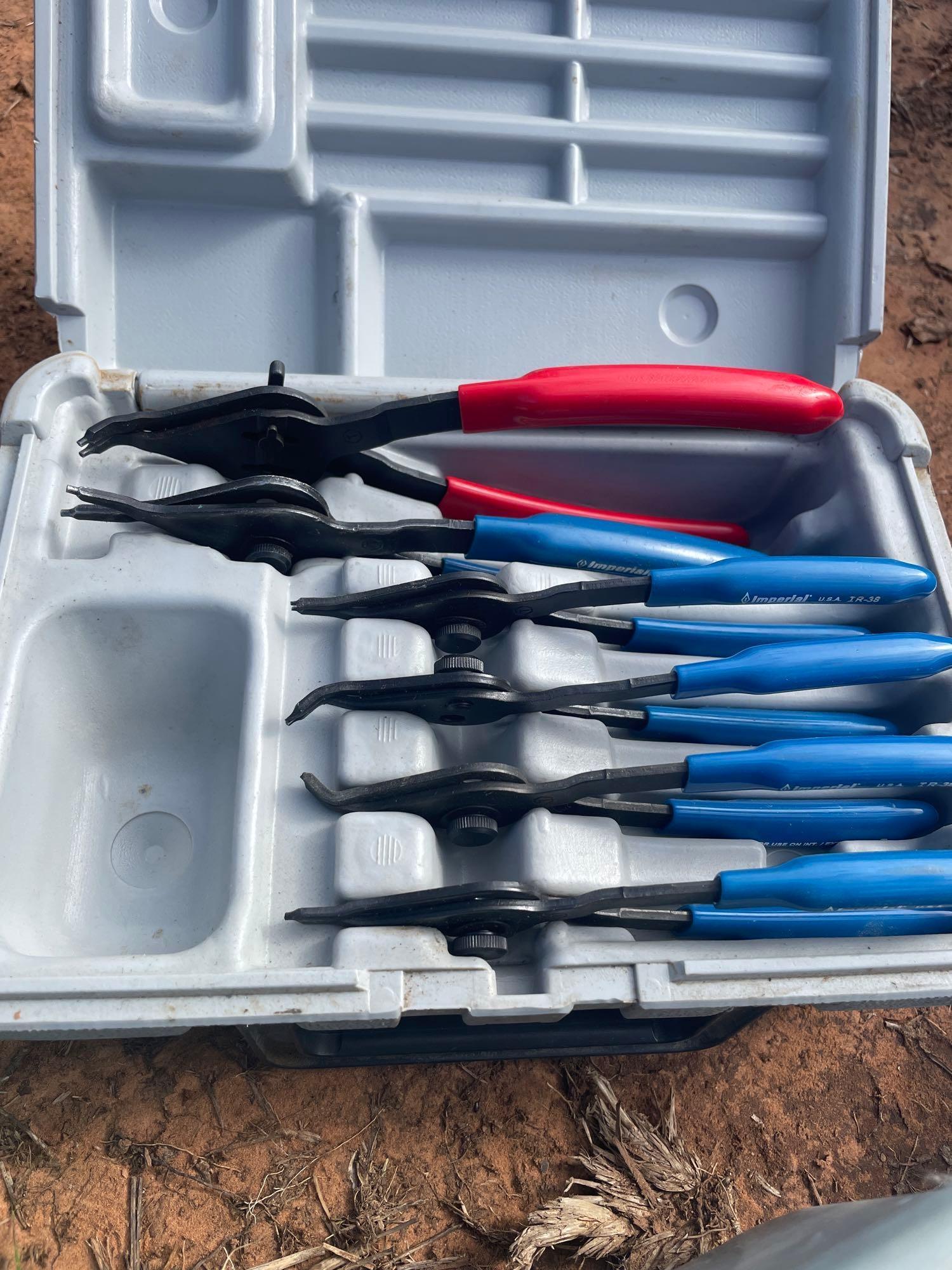 tub of drill bits and snap ring pliers