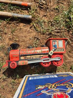 cowboy christmas lights, antique toy train and metal eating trays