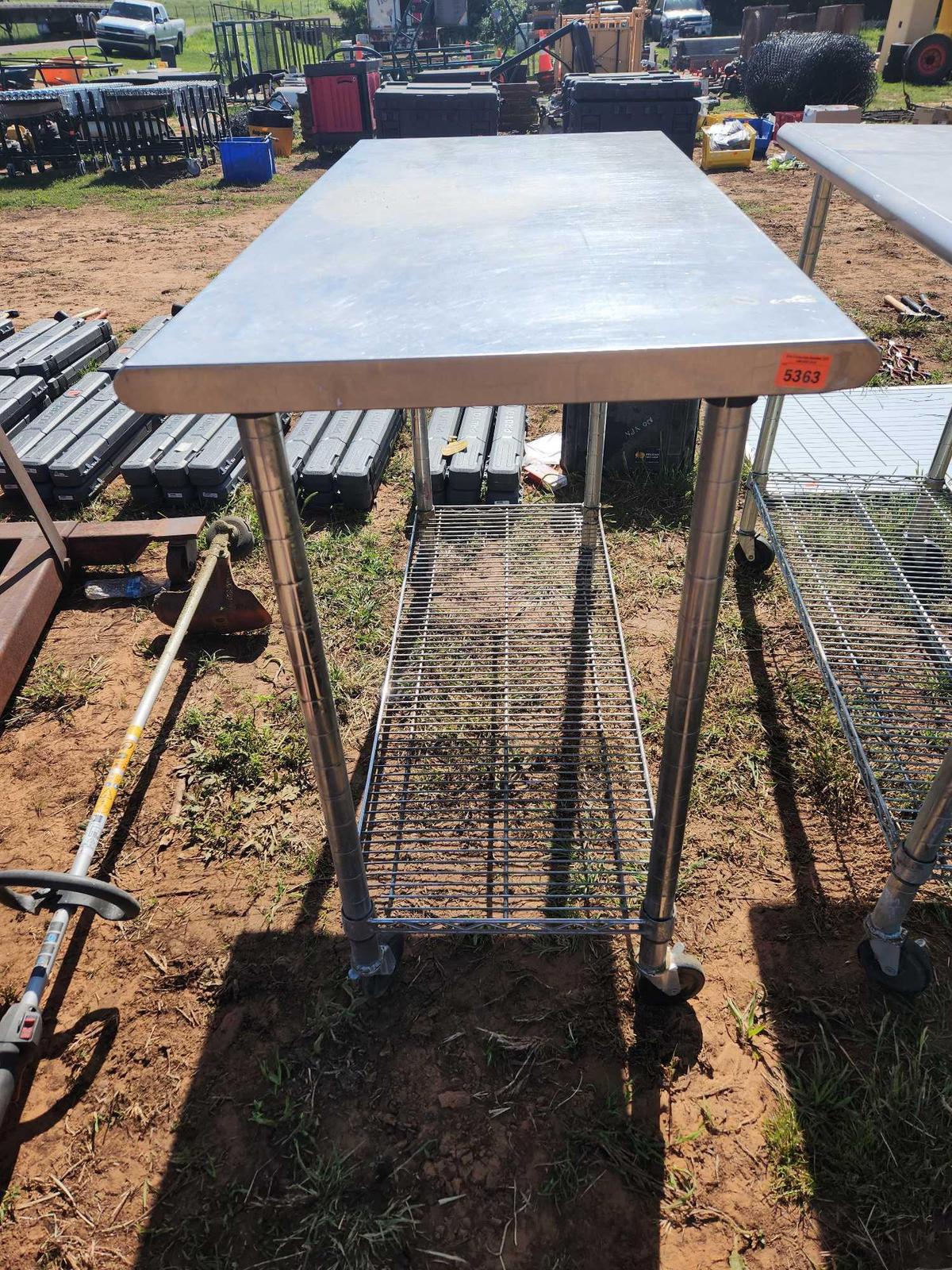 stainless steel table on casters and wire shelf
