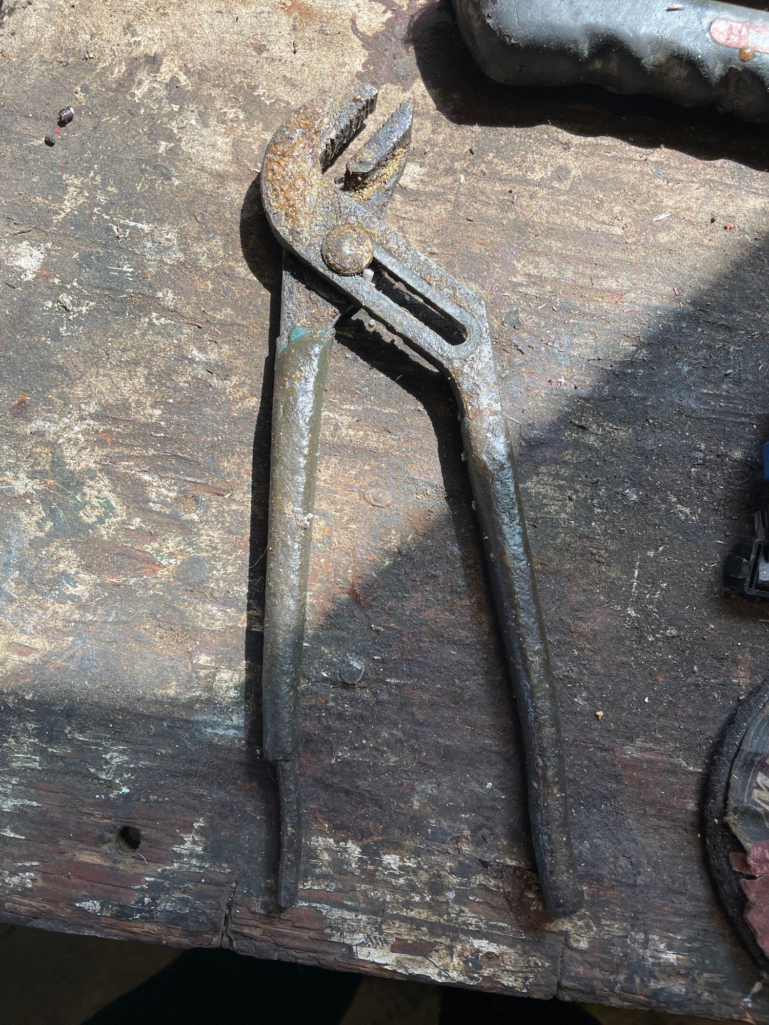 rubber mallet; hammer; tape measure; funnel