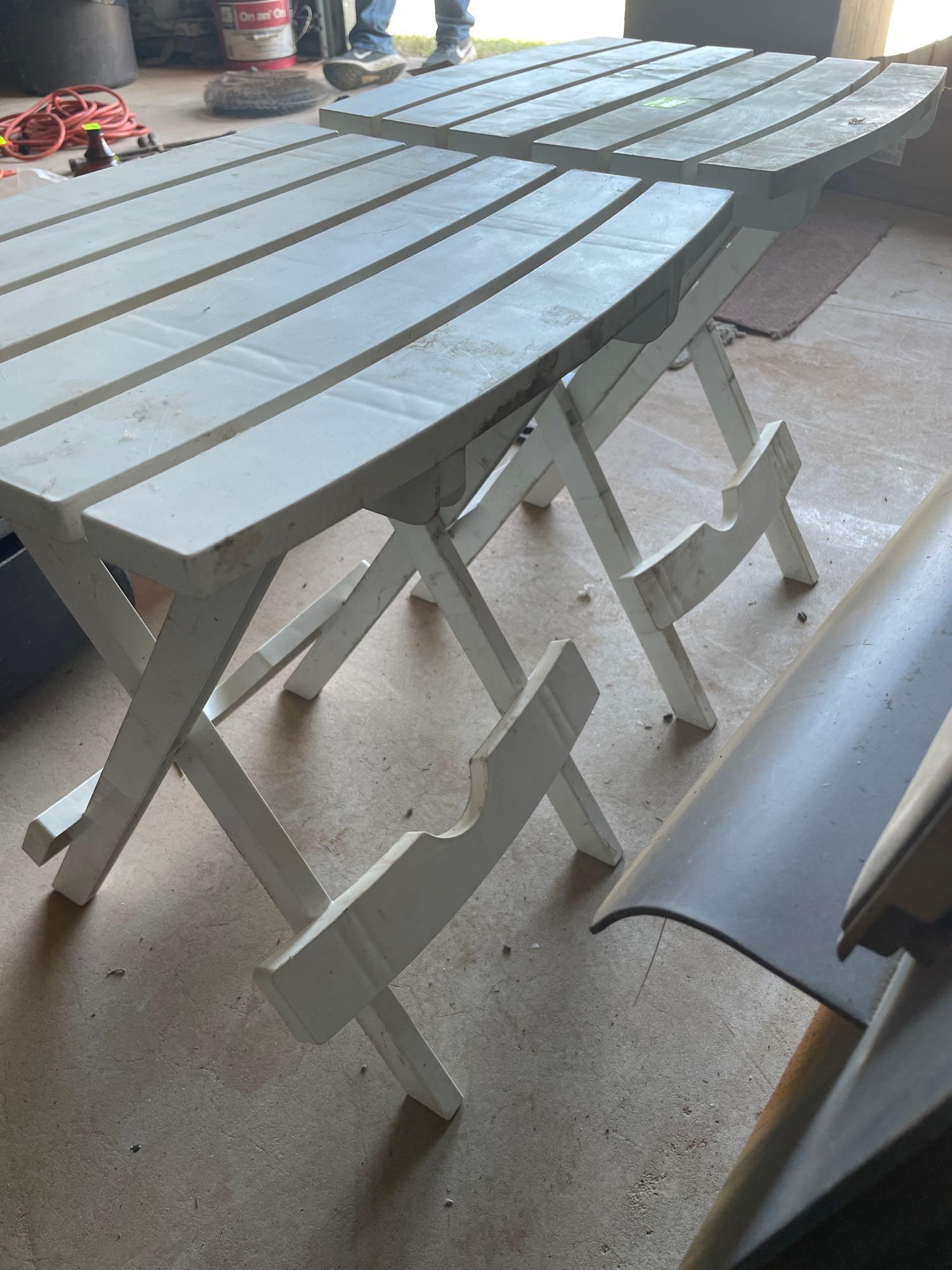 2 plastic folding tables