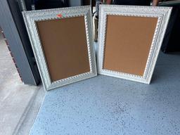 Two white frames, size in photos