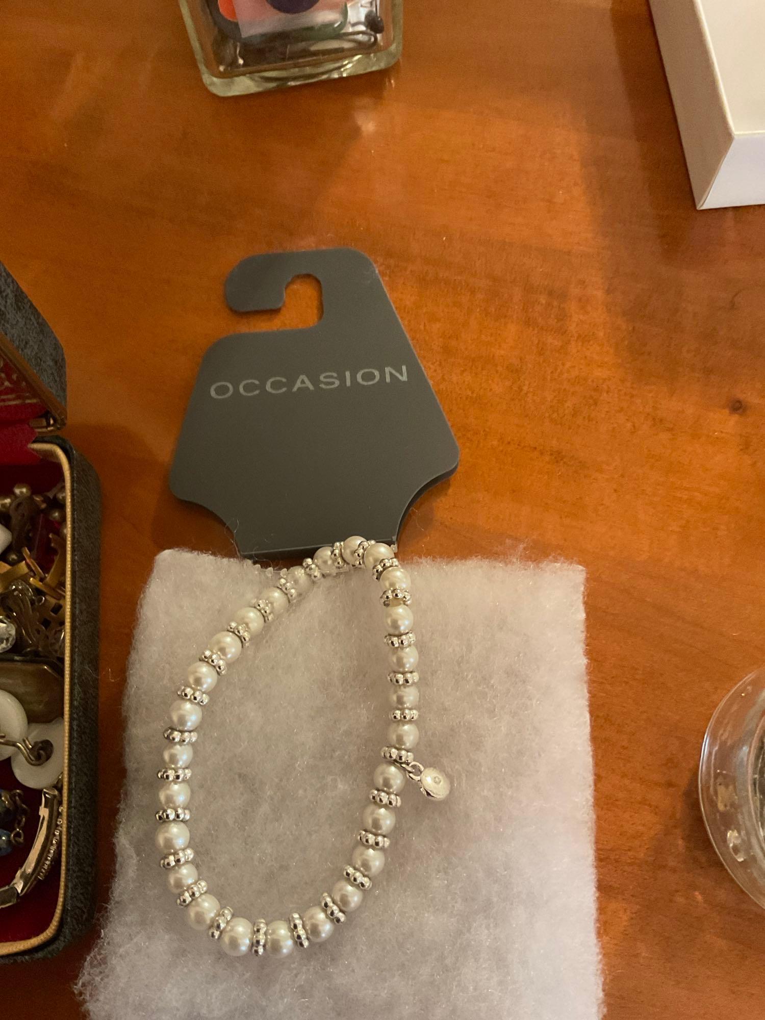 Purse. Oh, oh, come, let us adore him arts heart with buttons and keys. Purse. Chest with pens in it
