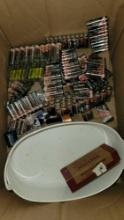 assorted batteries, tray, staples