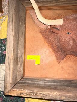 Hand embossed leather bull