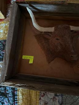 Hand embossed leather bull