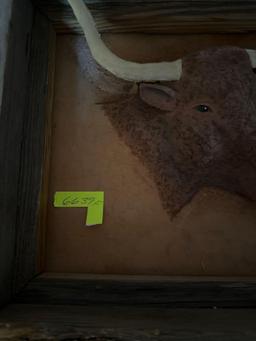 Hand embossed leather bull