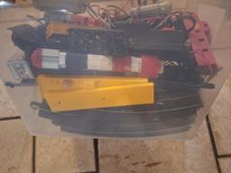 tub of trains and tracks