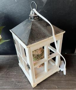 Electric lantern and hydrangea