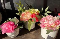 3 small floral arrangements