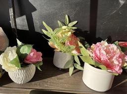 3 small floral arrangements