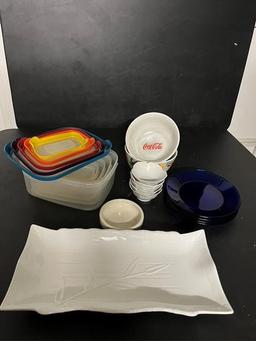 Serving platter, cobalt plates, flower-shaped small bowls, Coca-Cola bowls, food storage containers