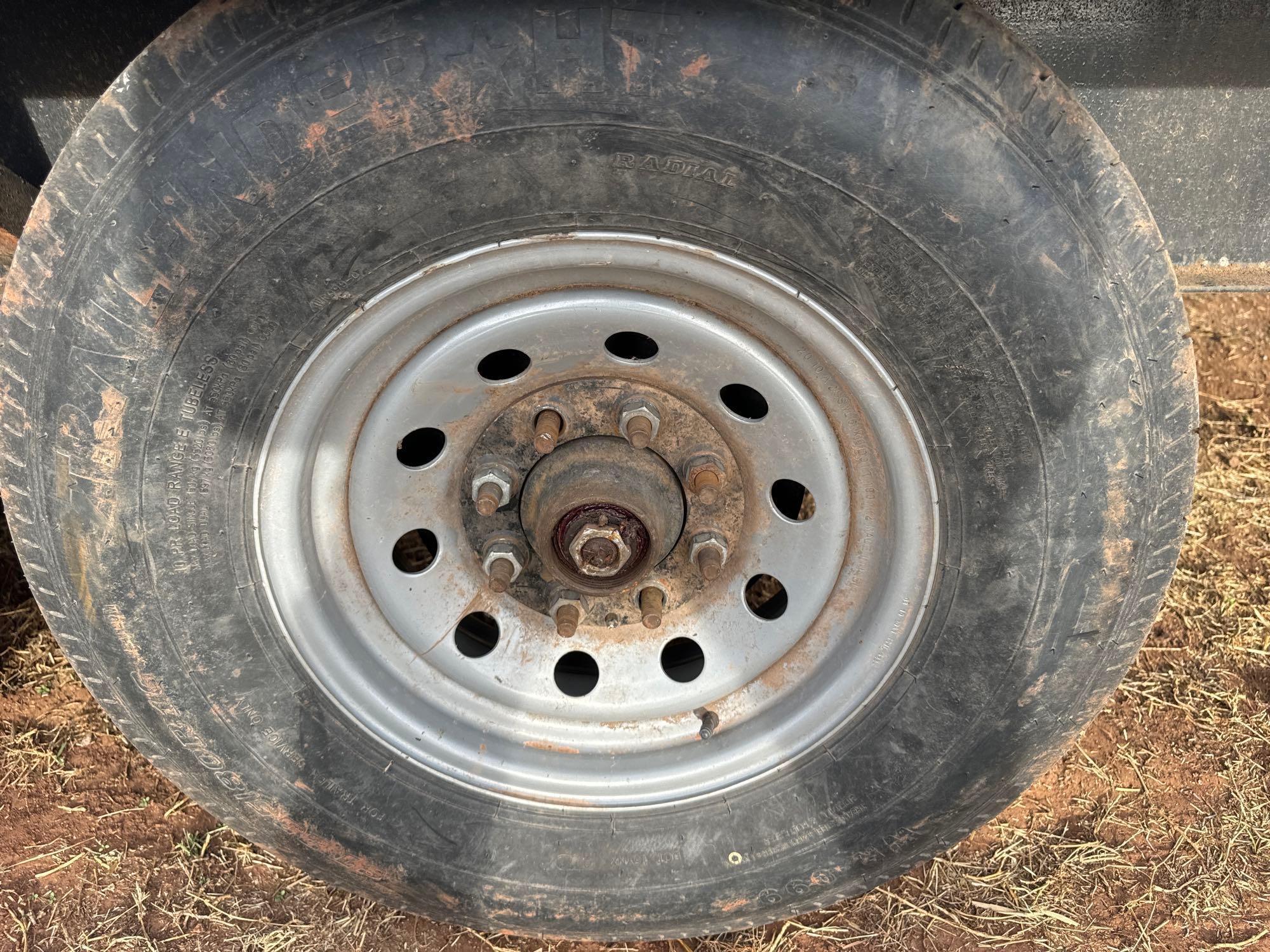25x8 dovetail with ramps ,good tires three 90% one 50% rubber nice trailer NO TITLE