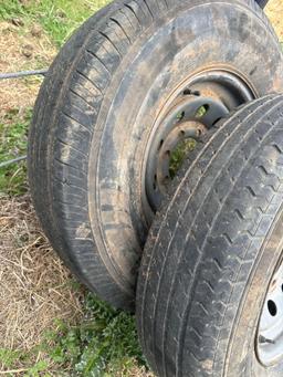 2x money. Two tires and wheels 235/80/16 One is flat