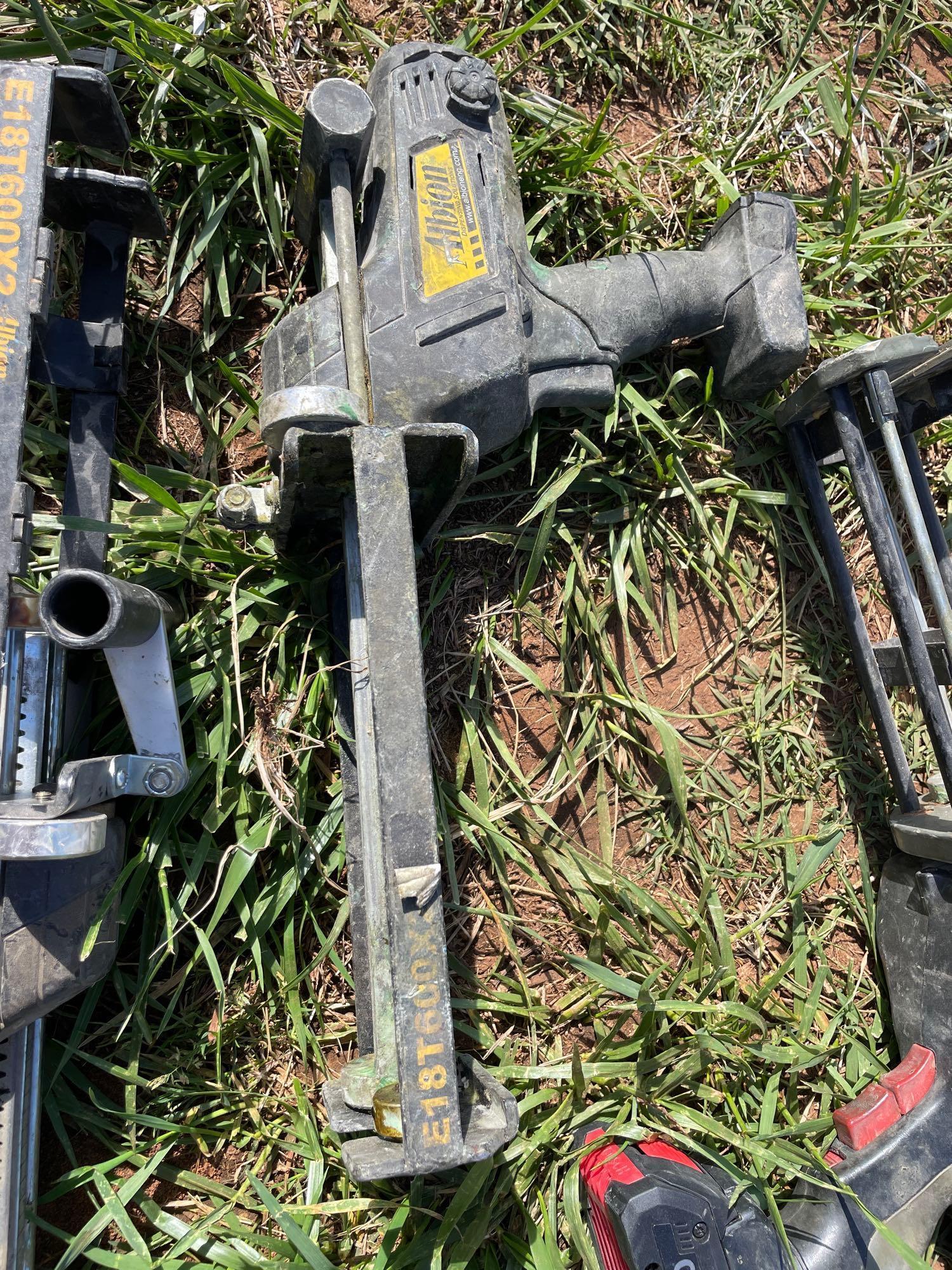 I - adhesive and caulking gun
