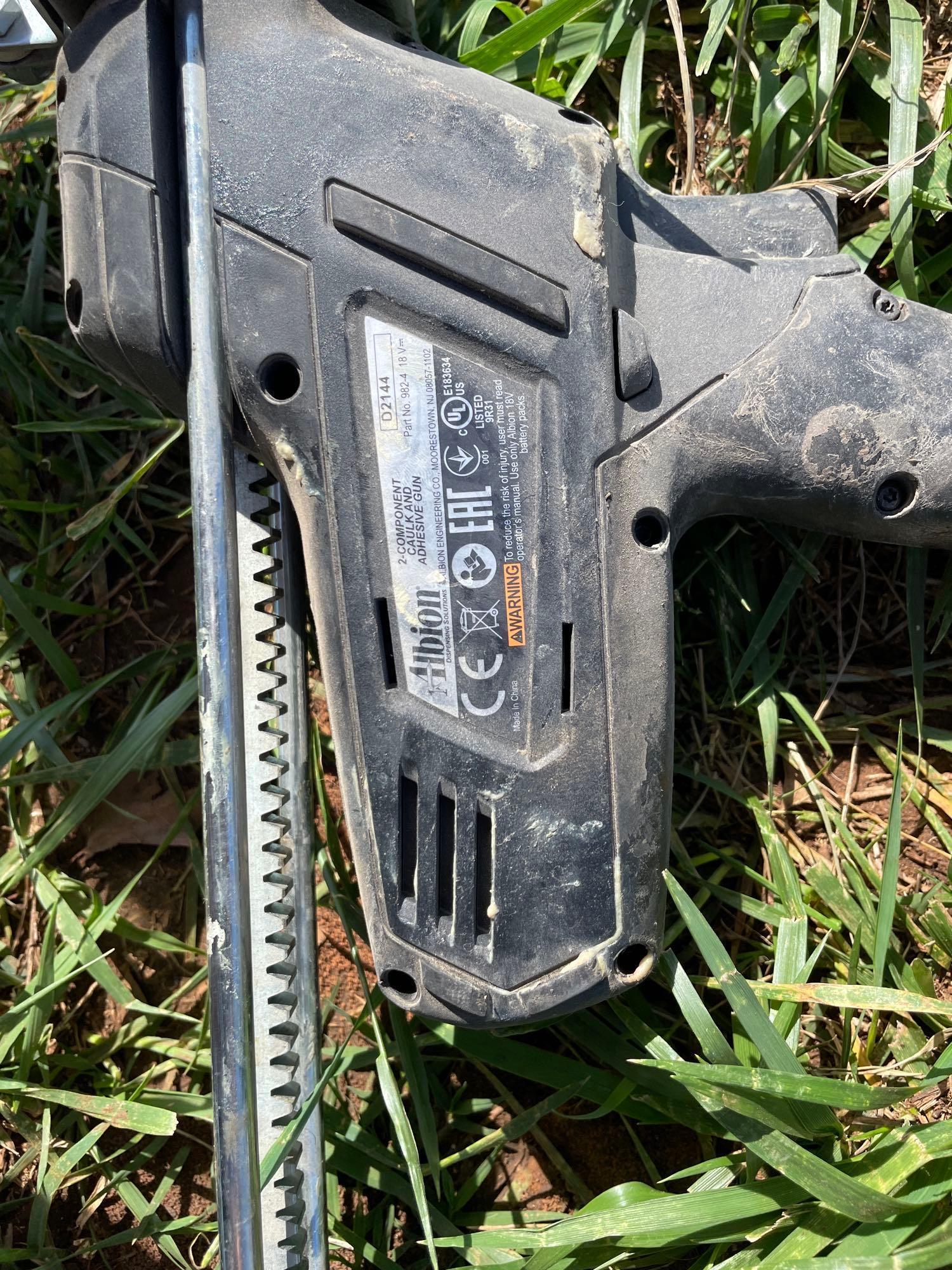I - adhesive and caulking gun