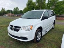 A- 2016 Dodge Grand Caravan with handicap lift