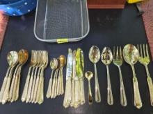 30 Piece Set of Ornate, Gold Toned Flatware and Serving Utensils.