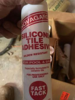 Silicone tile Adhesive.