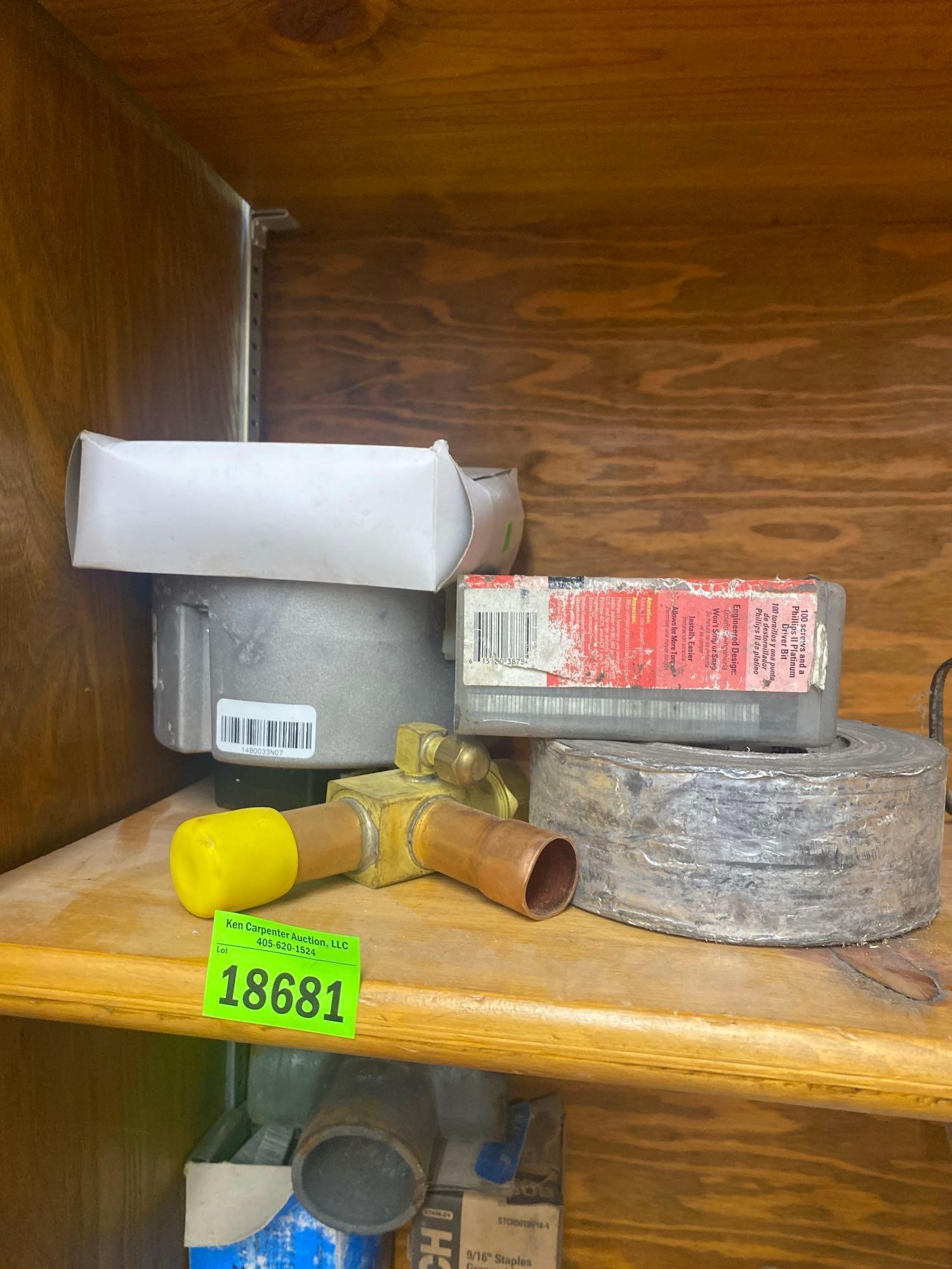 Staples, tape, Heat thermostat, and unknown item