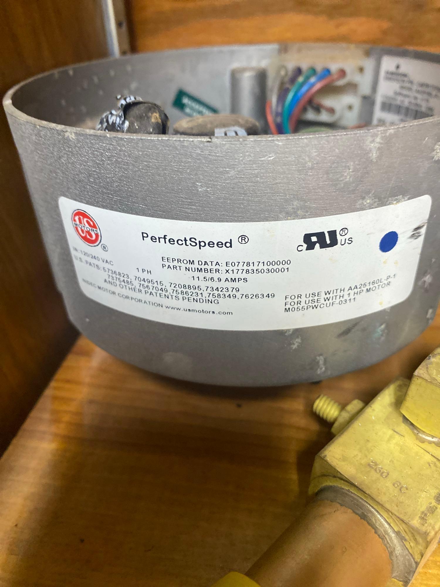 Staples, tape, Heat thermostat, and unknown item