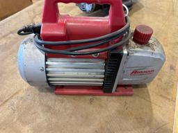 Two stage vacuum pump