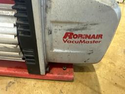 Two stage vacuum pump