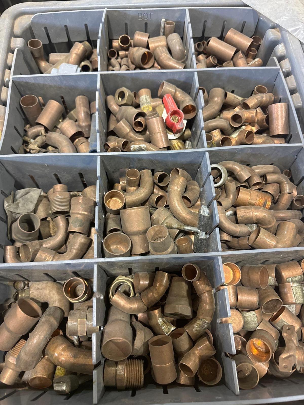 Organization tote with various brass/copper fittings