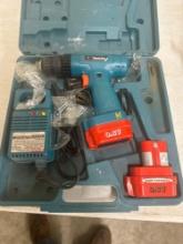 Makita drill in case with batteries