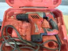 Milwaukee corded hammer drill in case