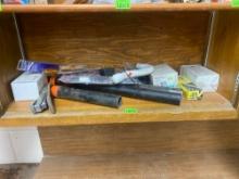 Lot contains items on shelf, thermostat, double bulb marker lamp, stapler, black pipe and other