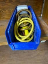 Blue container with misc items