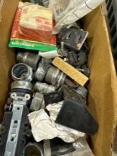 Box with misc pipe fittings