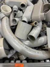 Tote with various PVC pieces and fittings