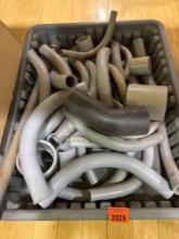 Tote with various PVC pieces and fittings