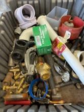Tote with PVC cutter, brass T's, black pipe items, PVC fittings and other various items