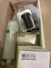 Vacuum breaker, soap dispenser bottle, lever handle bases, cap with adjusting ring